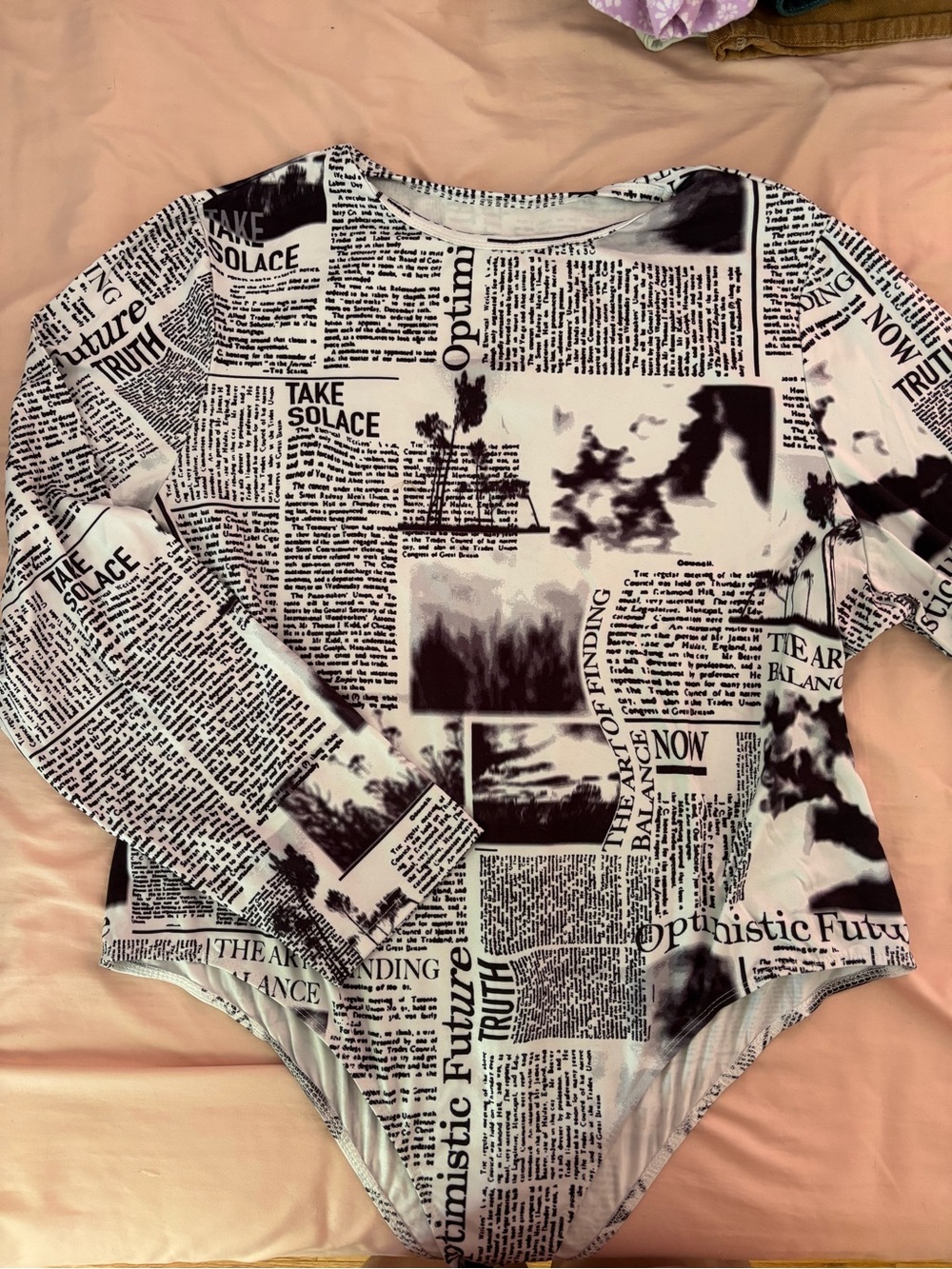 Black & White Newspaper Print Long Sleeve Bodysuit